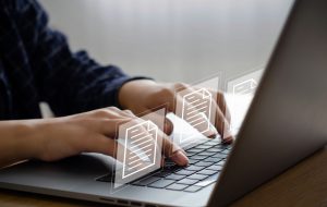 Businessman printing paperless workplace concept computer. electronic signing electronic signature document management Businessman signs electronic documents on digital documents on virtual notebook screen using stylus pen.