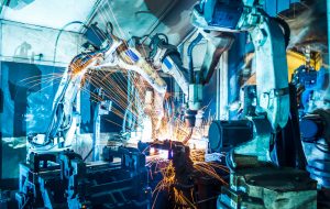 Welding robots movement in a car factory