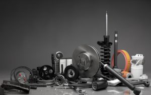New car parts on a gray background