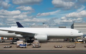 Cargo aircraft is loading at the airport.